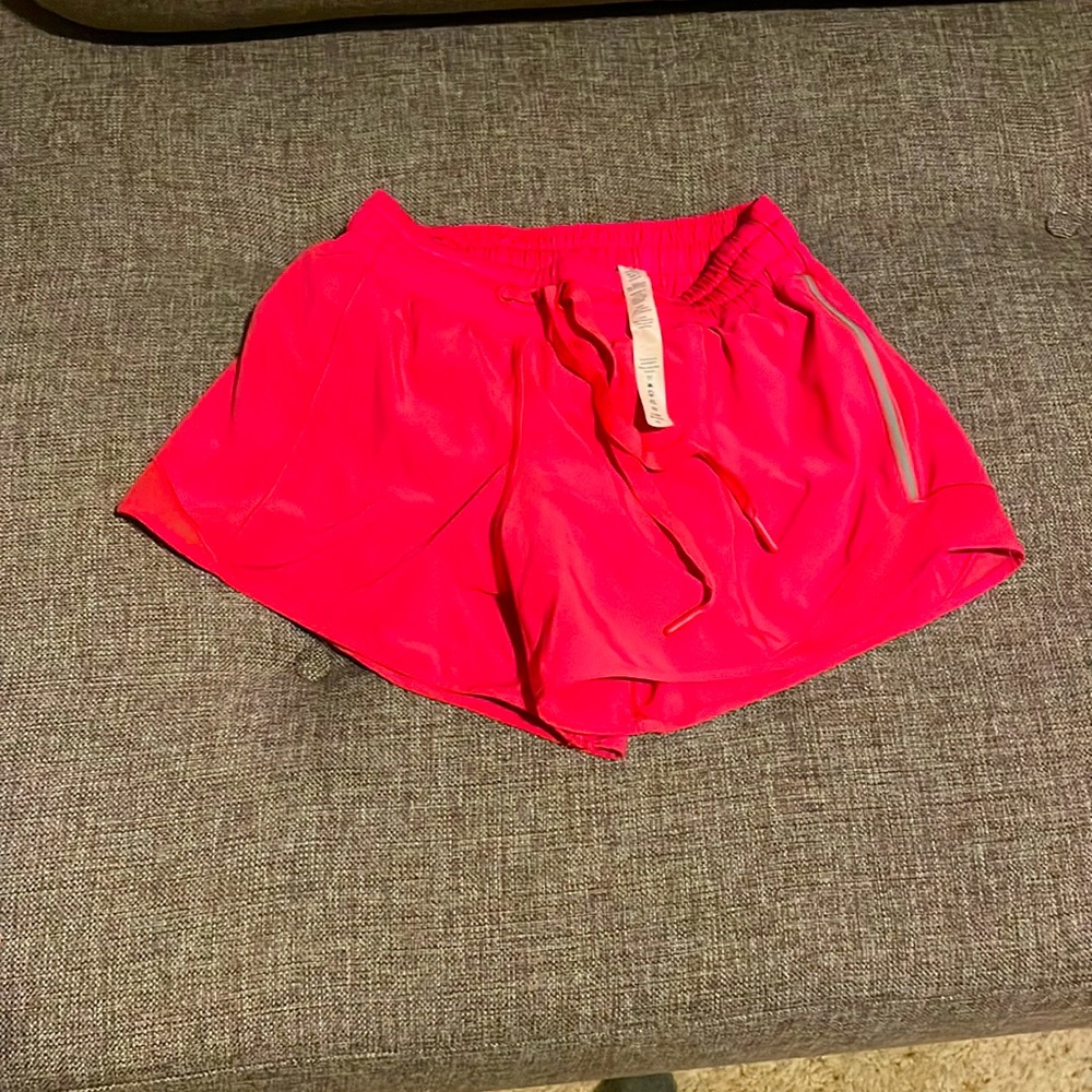 Pink Lululemon size 4 running shorts